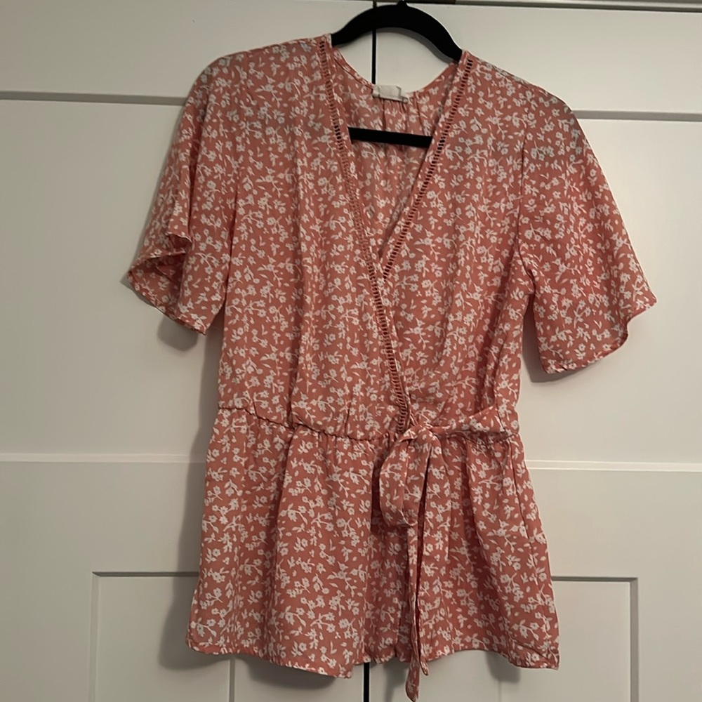 Pink floral faux-wrap top